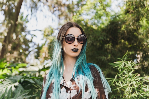 Portrait of young woman with dyed hair