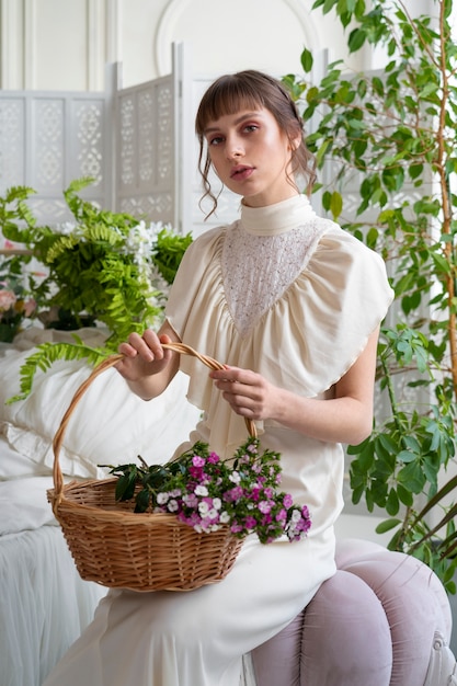 Portrait of young woman with flowers wearing a boho chic dress