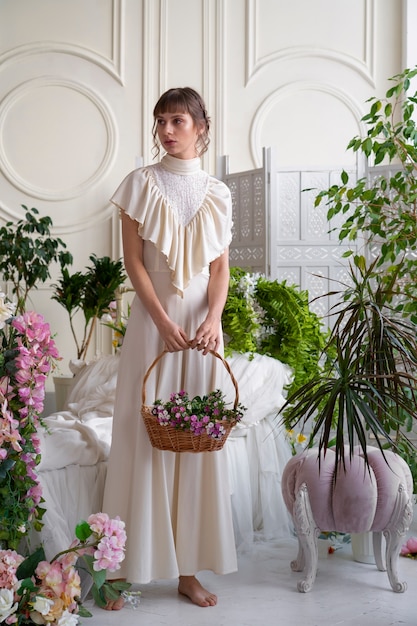 Portrait of young woman with flowers wearing a boho chic dress