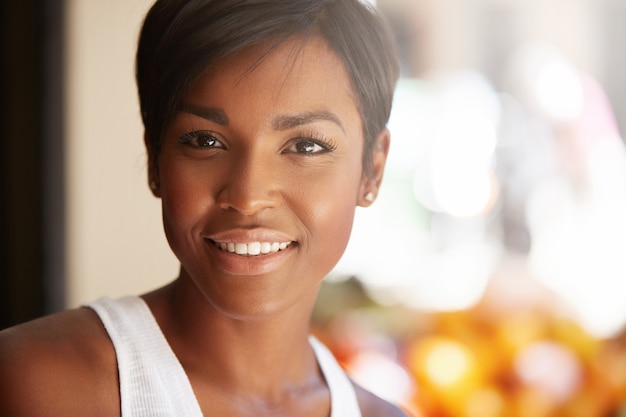 Portrait of young woman with short hair