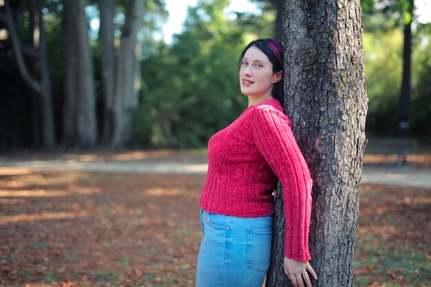 portrait of a young womna in a park