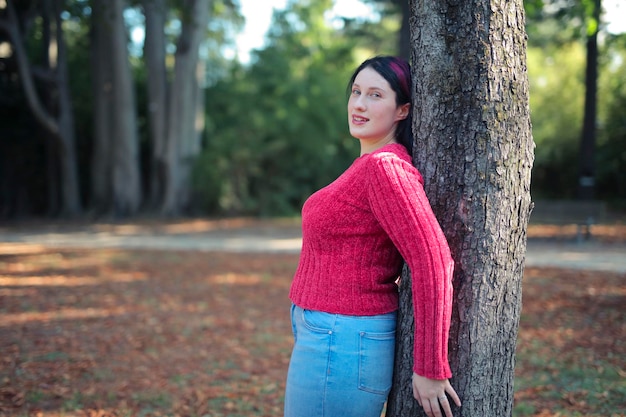 portrait of a young womna in a park