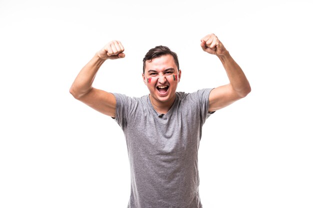 Portugal win. Victory, happy and goal scream emotions of Portugal football fan in game support of Portugal national team on white background. Football fans concept.