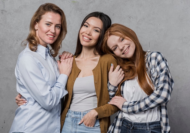 Free photo positive group of women smiling together