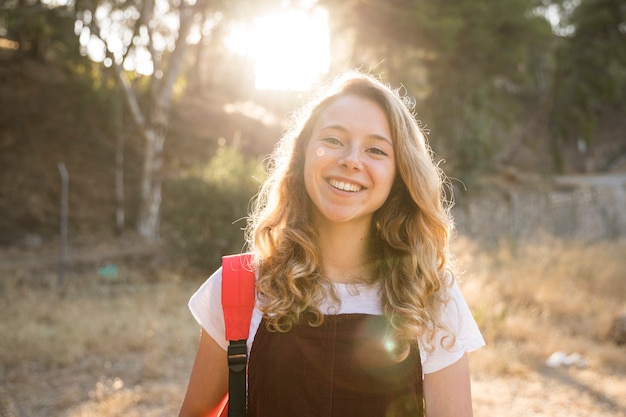 Free Photo positive teen girl smiling in nature