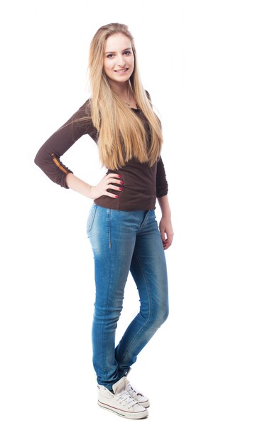 Positive teenager in jeans