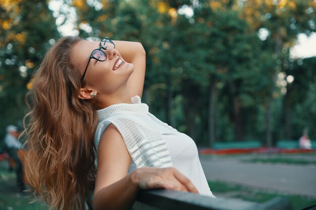 Positive woman having a break from city noise