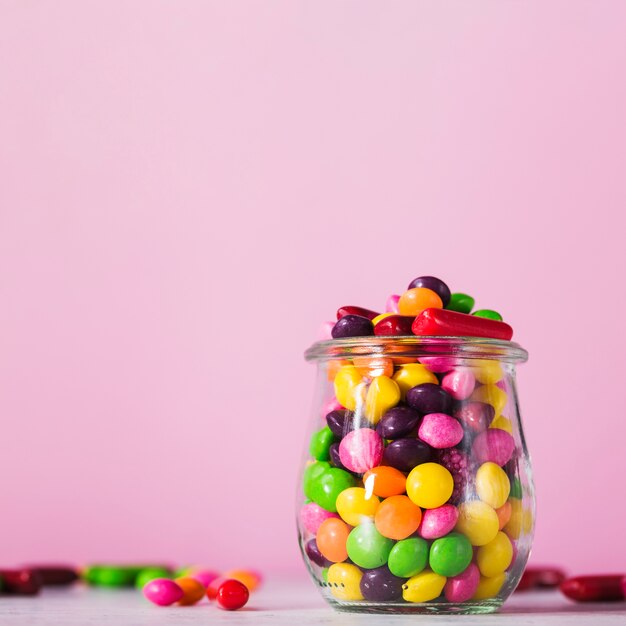 Pot with tasty sweets