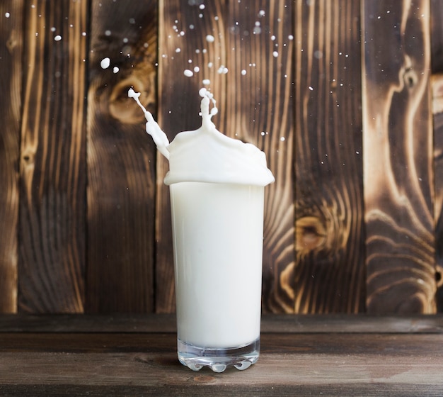 Pouring milk out of glass