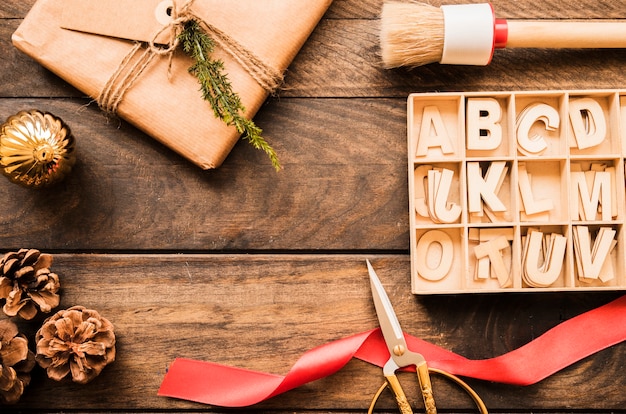 Present box, scissors, snags and letters