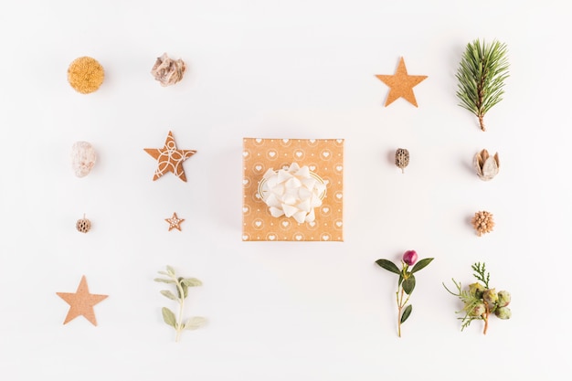 Present box between set of decorations 