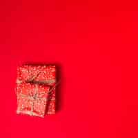 Free photo present boxes in sweetie papers with threads