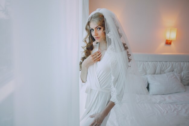 Pretty bride in his room