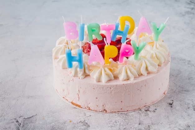 Pretty cake decorated with candles