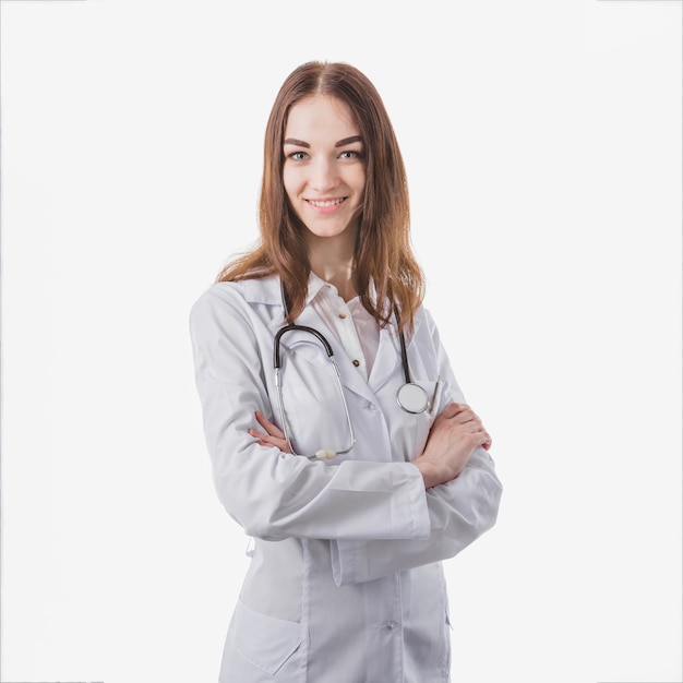 Free photo pretty female doctor with arms crossed