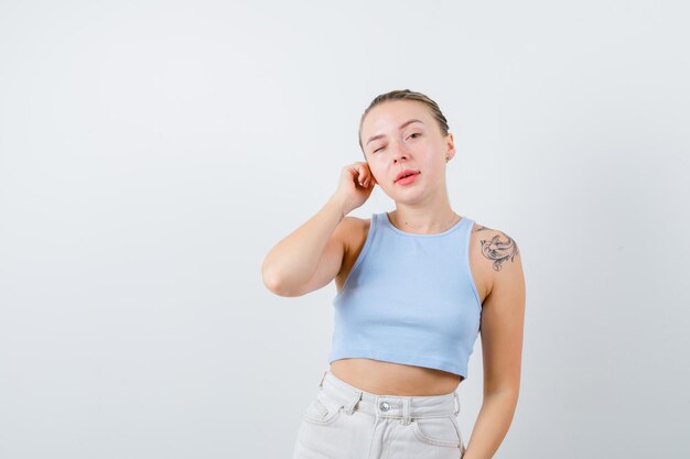 pretty girl is calling to somebody on white background