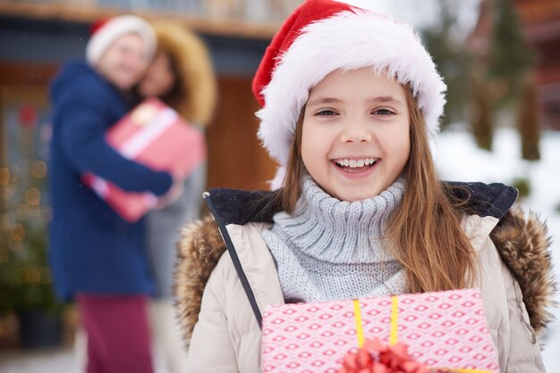 Pretty girl with Christmas gift