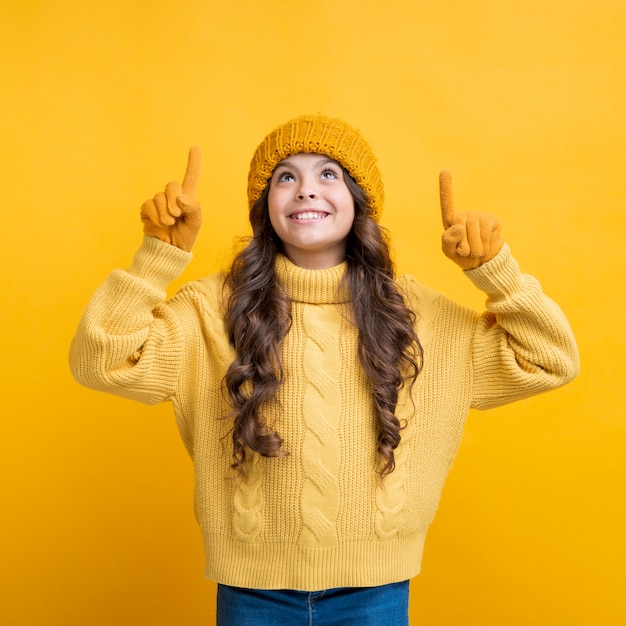 Free Photo pretty girl with gloves looking up