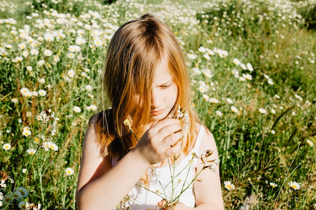 Free Photo pretty girl with wild flowers