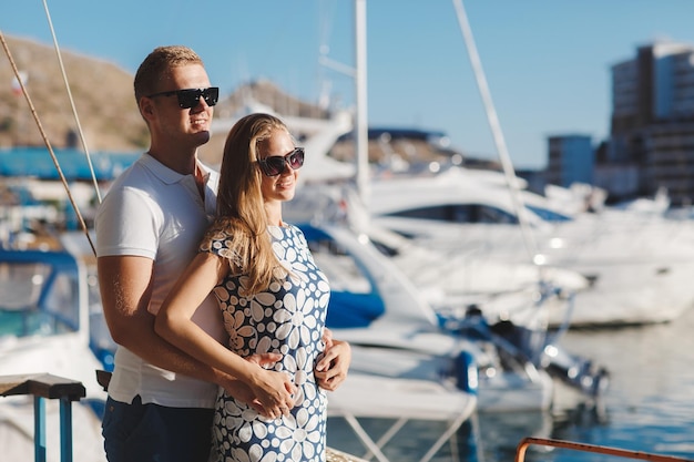 Free Photo pretty smiling couple woman and man outdoor