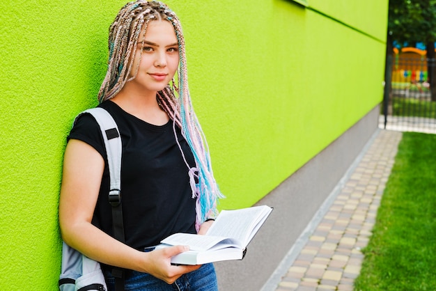 Free photo pretty student posing in university