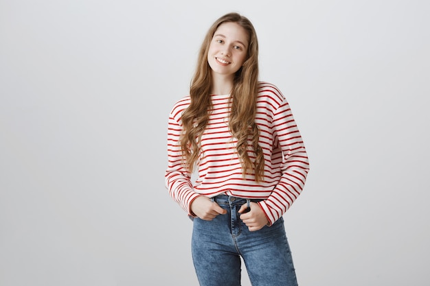 Free photo pretty teenage girl, college student smiling