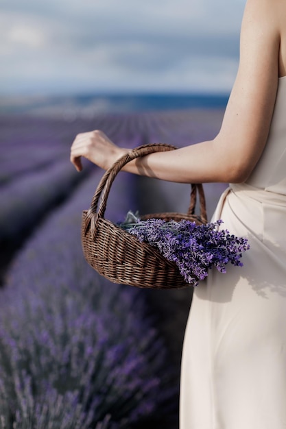 pretty woman in dress in lavender field