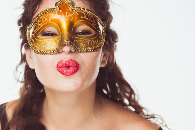 Free Photo pretty woman in mask kissing air