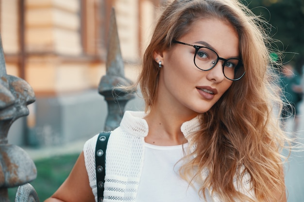 Pretty woman walking in a European city during the weekend