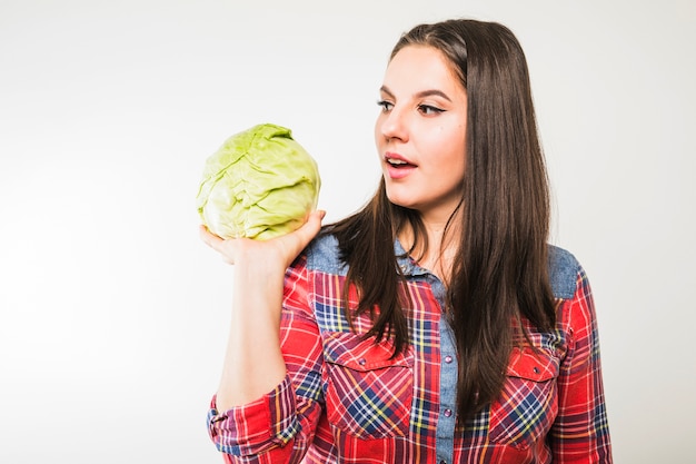 Pretty woman with cabbage