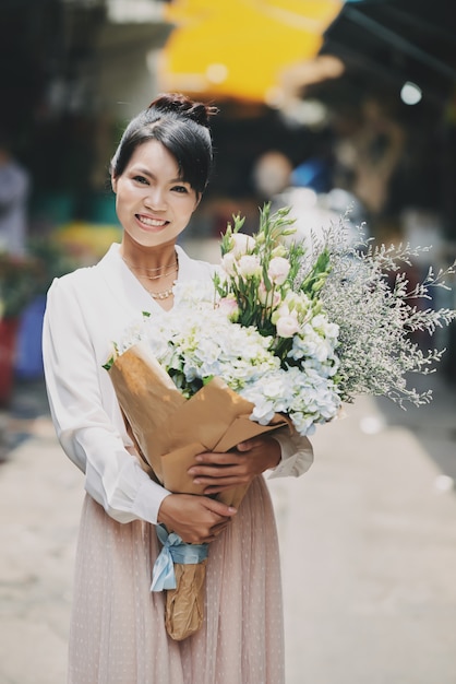 Pretty woman with flowers