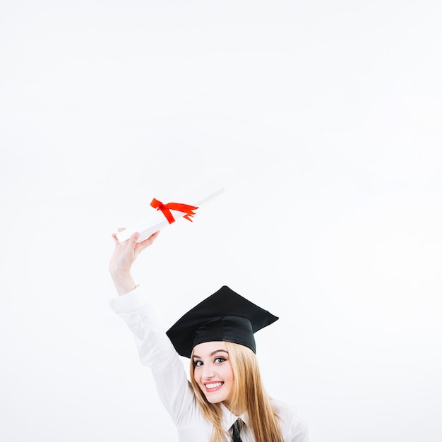 Free photo pretty woman with graduation paper