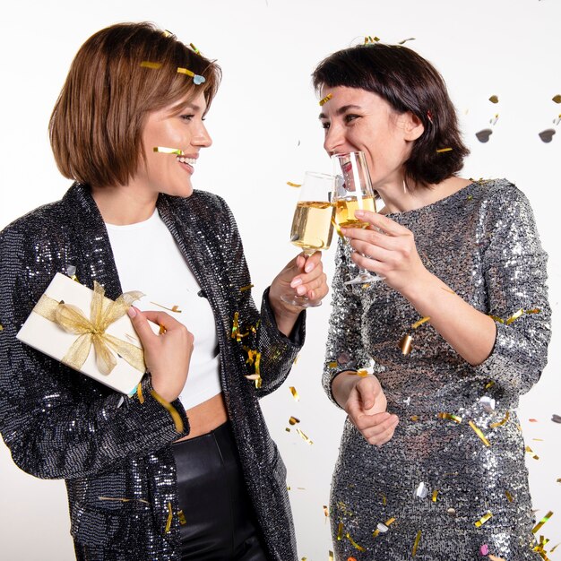 Pretty women celebrating new year's eve at home