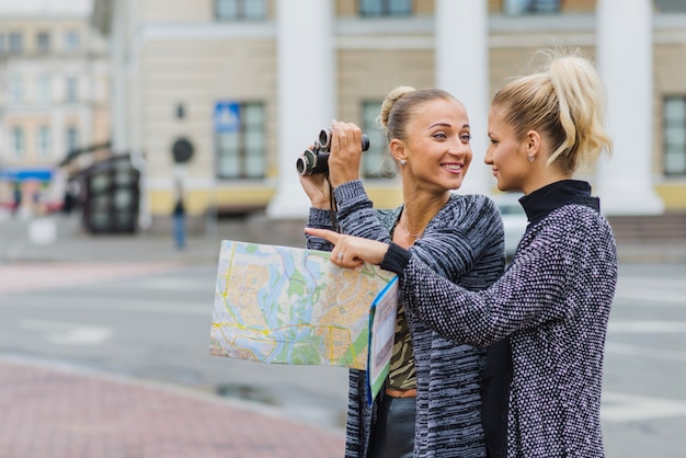 Pretty women sightseeing in city