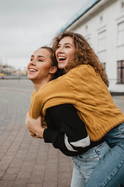 Free photo pretty young girls having fun together