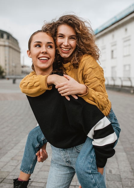 Free photo pretty young girls having fun together