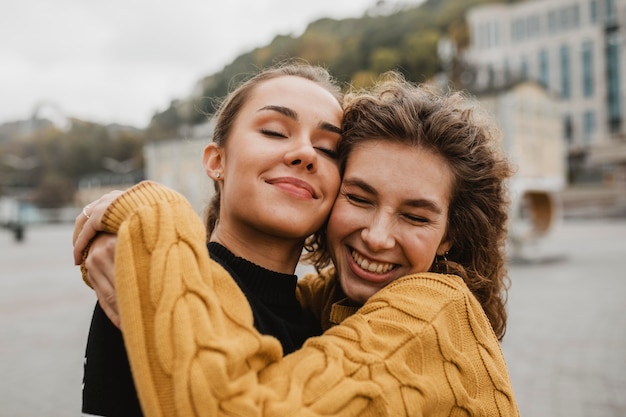 Pretty young girls posing together