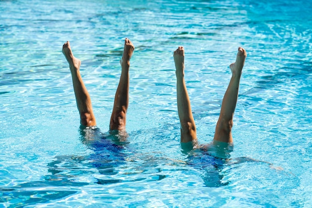 Free photo pretty young girls posing in the water