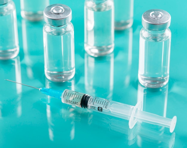 Free photo preventive coronavirus vaccine bottles composition