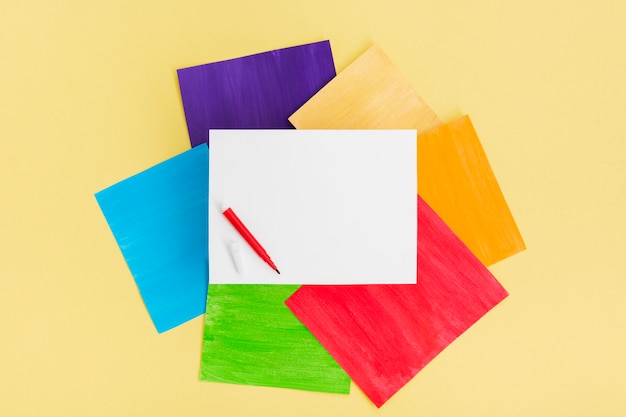 Free photo pride day concept pile of coloured paper