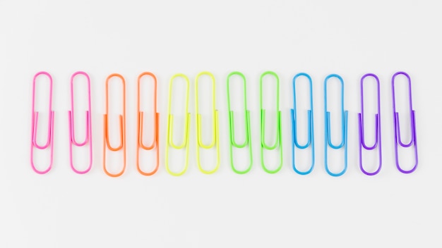 Free photo pride flag with colorful paperclips