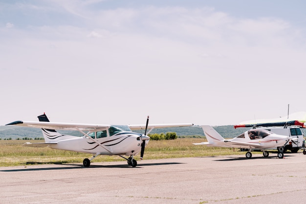 Free Photo private airplanes in the field