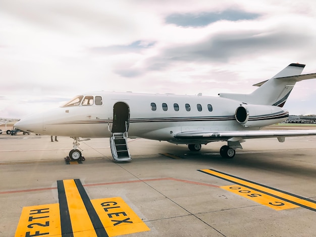 Free photo private luxury jet at the airport terminal