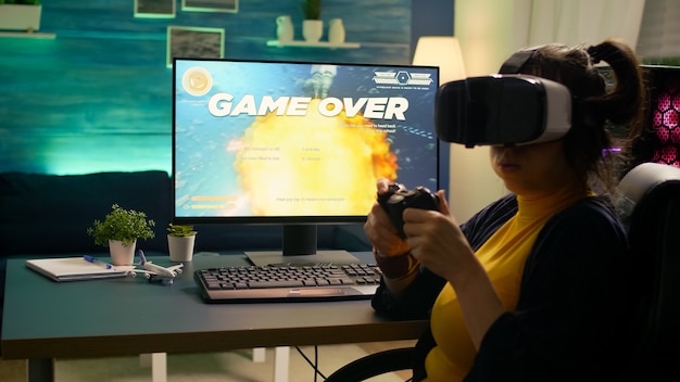 Free photo pro video game r losing space shooter competition while wearing virtual reality headset