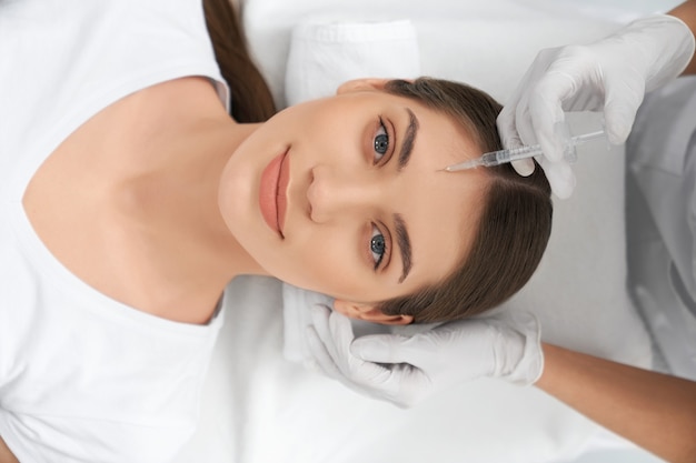 Free photo procedure for improvements face skin in beautician