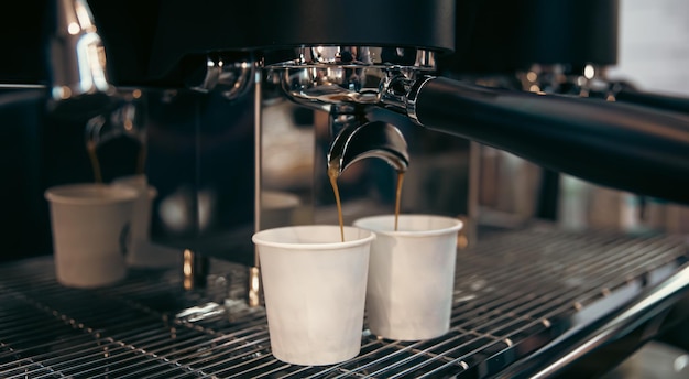 The process of preparing espresso in a professional coffee machine closeup