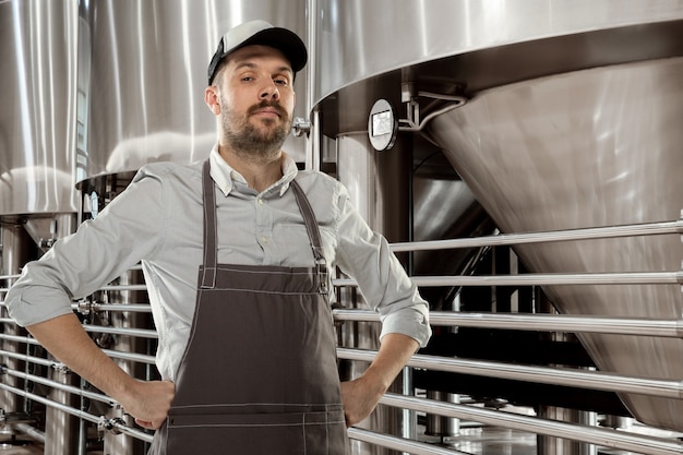 Free Photo professional brewer on his own craft alcohol production