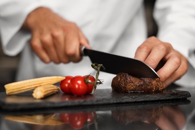 Free Photo professional chef preparing food in the kitchen