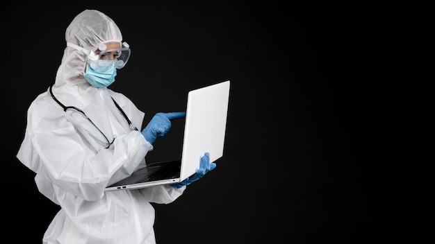 Free Photo professional doctor wearing pandemic medical equipment