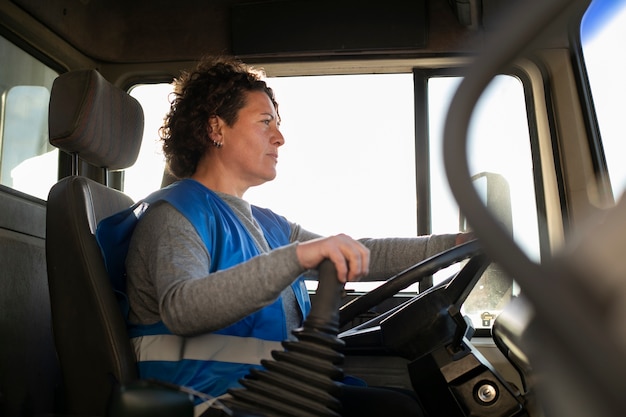 Professional female driver with van or wagon car